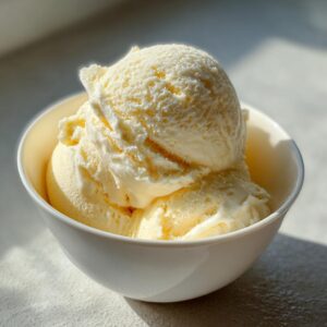 A bowl of creamy no-churn vanilla ice cream with condensed milk, perfect for a simple dessert.