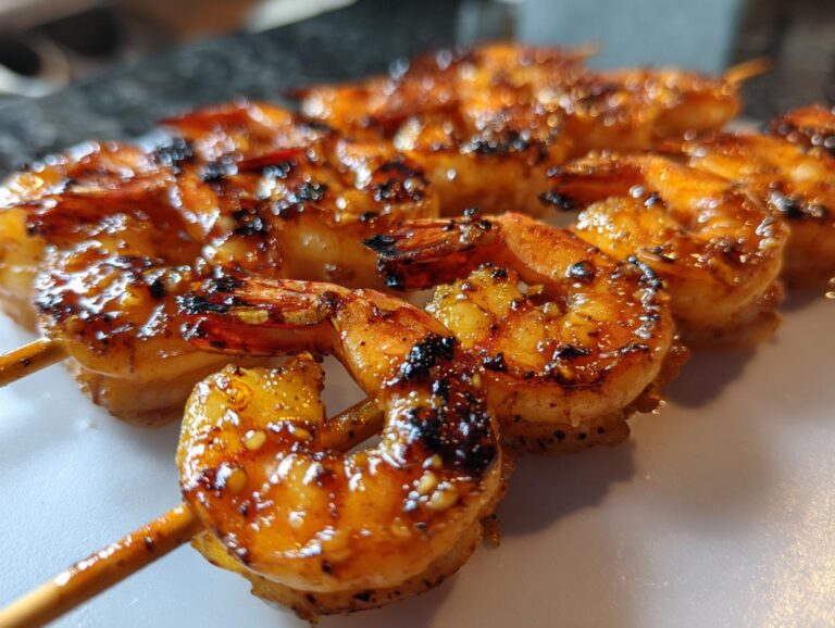Close-up of Honey Garlic Grilled Shrimp Skewers, showing the glaze and grill marks.